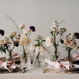 Ribbed Glass Bottles filled with Flowers