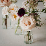 Ribbed Glass Bottles filled with Flowers